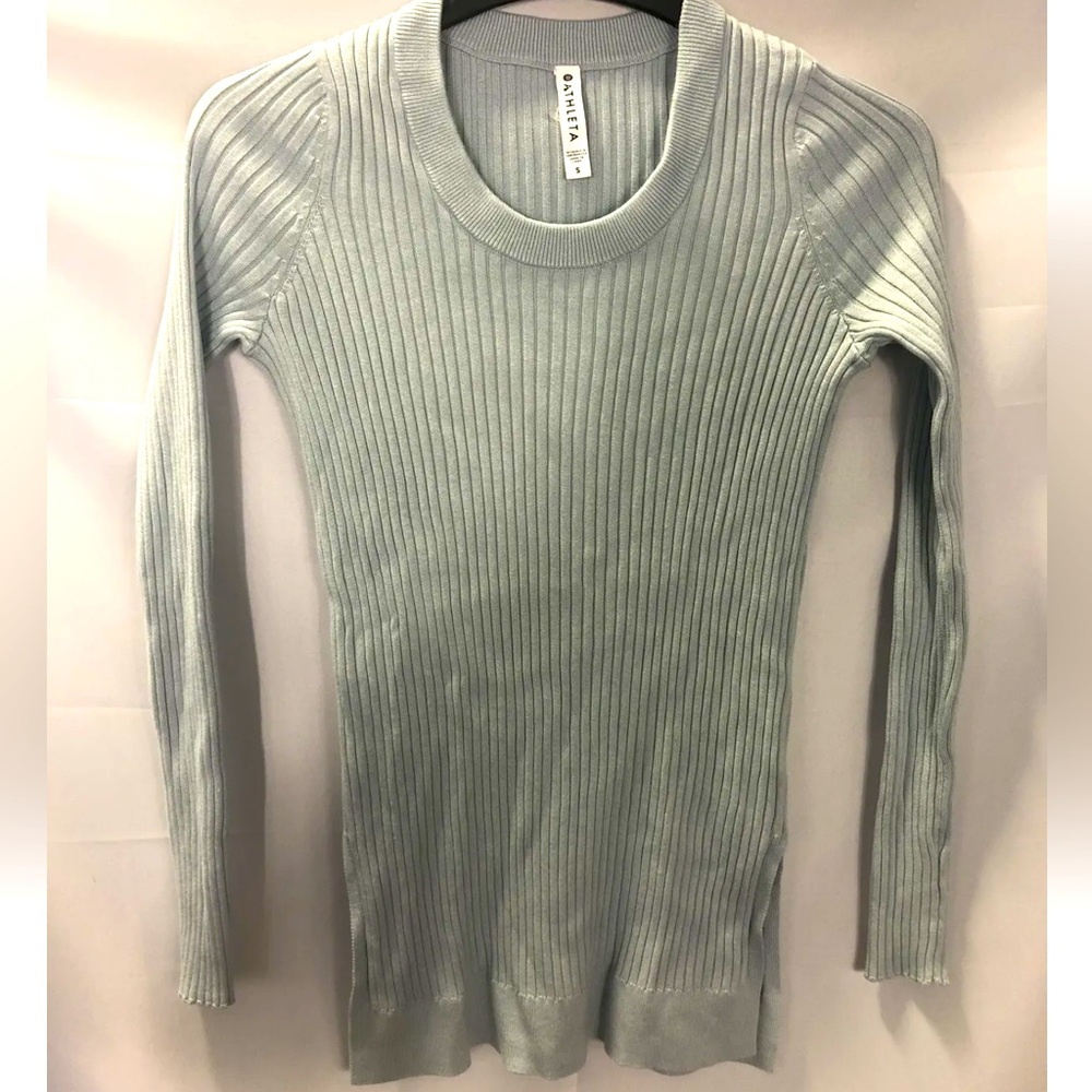 NWOT Beautiful baby blue. Will fit beautifully under anything or by itself.